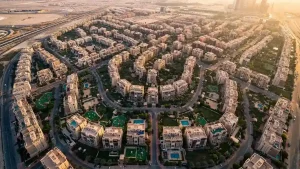 JVC Dubai residential tower cluster at sunset