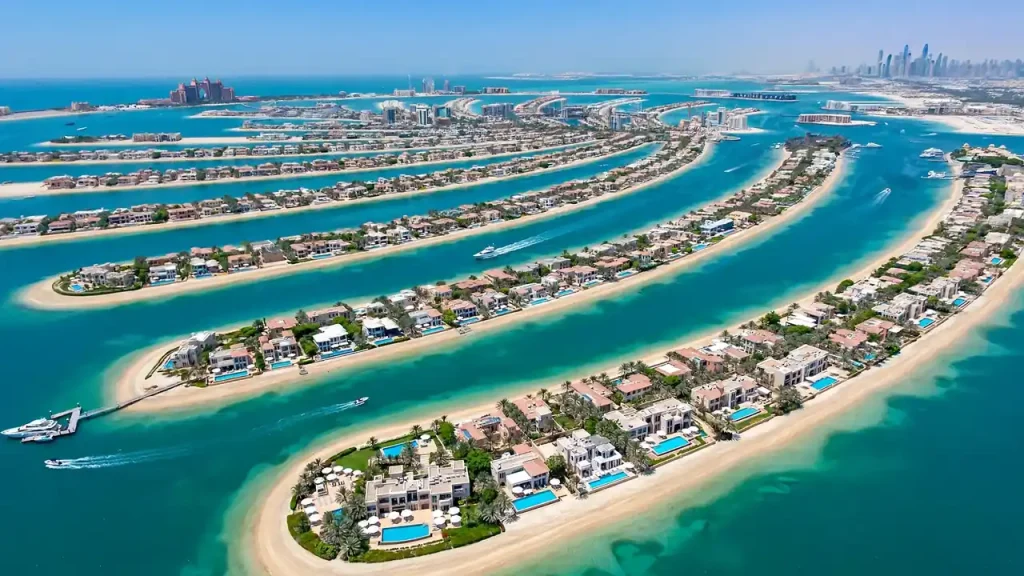 Best Areas to Invest in Airbnb in Dubai: ROI, Yields & Where to Buy Aerial view of Palm Jumeirah villas, luxury segment for Airbnb investment in Dubai